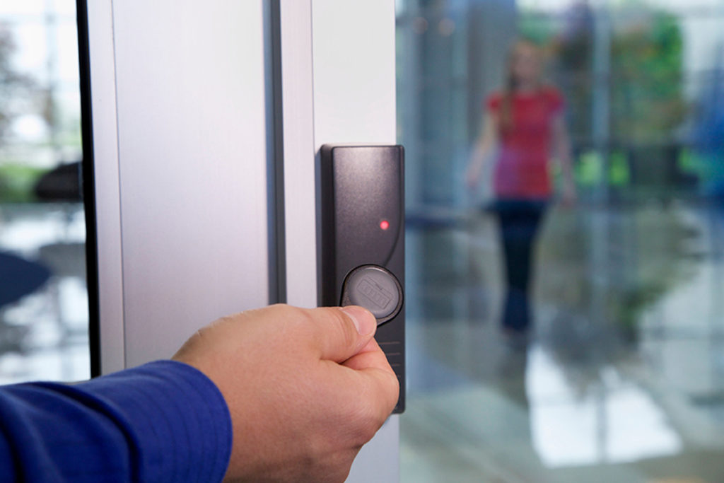 Man using a Habitec Security access control system.