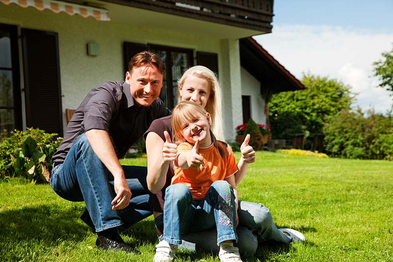 A family overcoming their homeowner concerns and enjoying their new home.
