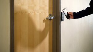 Employee unlocking door using ProDataKey cloud-based access control