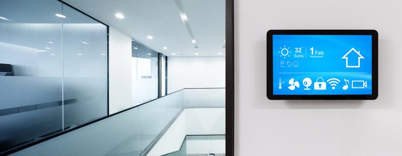 A modern smart home office filled with connected security and automation devices
